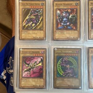 Vintage YuGiOh cards. Full starter deck Yugi #1-50. Like new, binder kept.